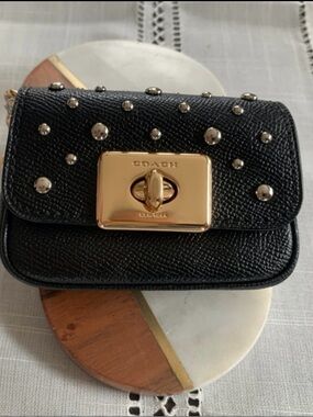 Coach Black Mini Turnlock Bag Charm with Gold Hardware and Silver Studs